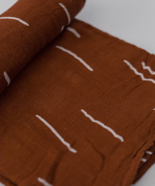 COTTON MUSLIN SWADDLE BLANKET - BAKED CLAY